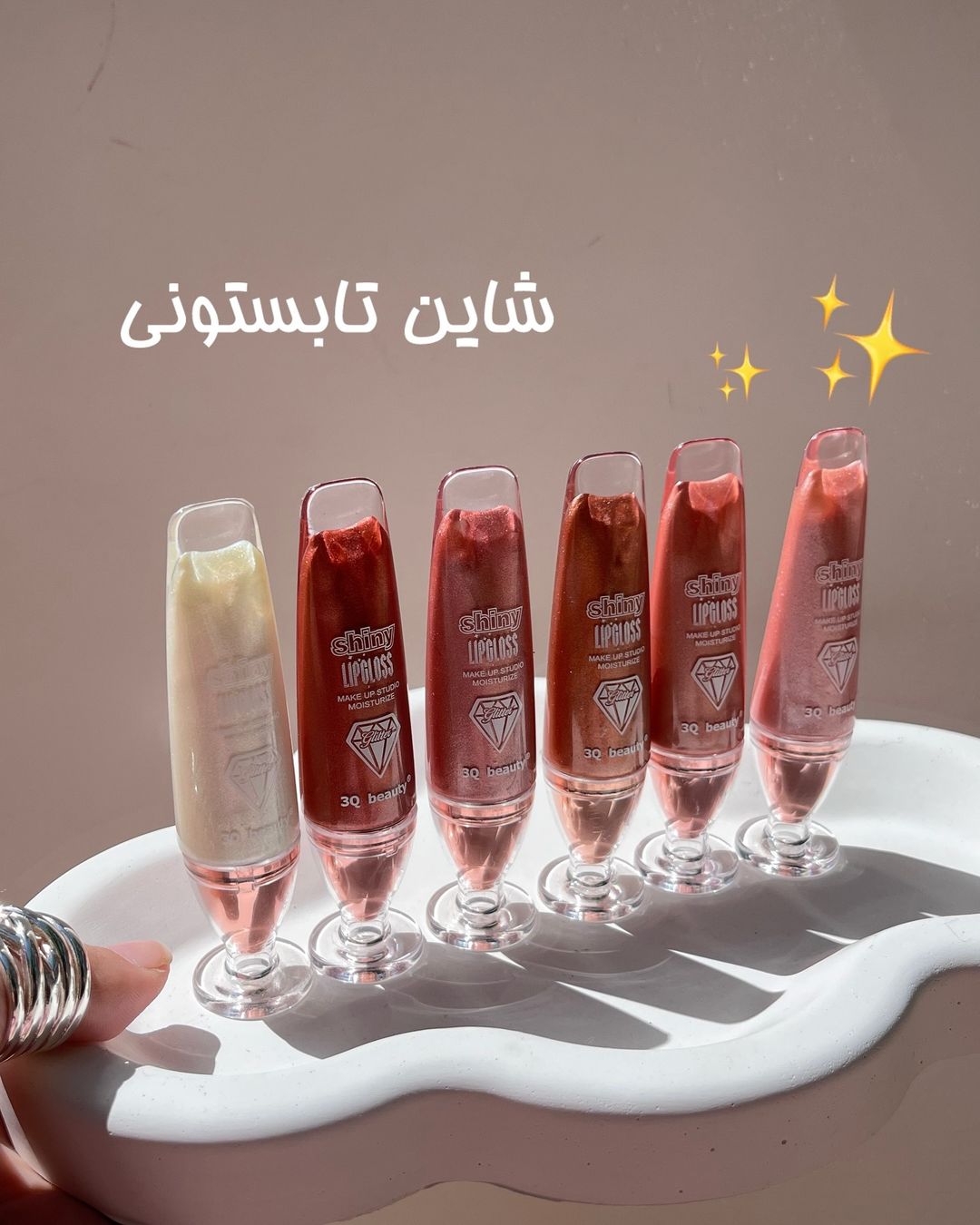 لیپ گلاس شاین دار چندکاره(هایلایتر /لیپ گلاس/رژگونه) با کیفیت فوق العاده ترند تیک تاک